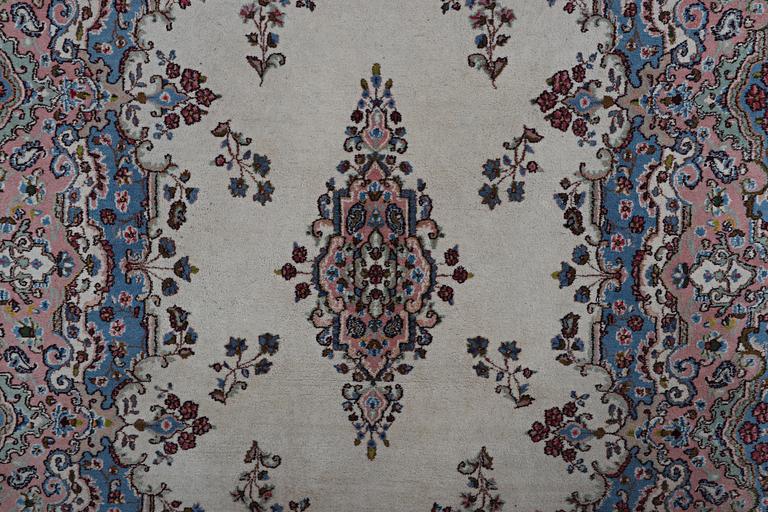 A carpet, Kirman, ca 280 x 213 cm.