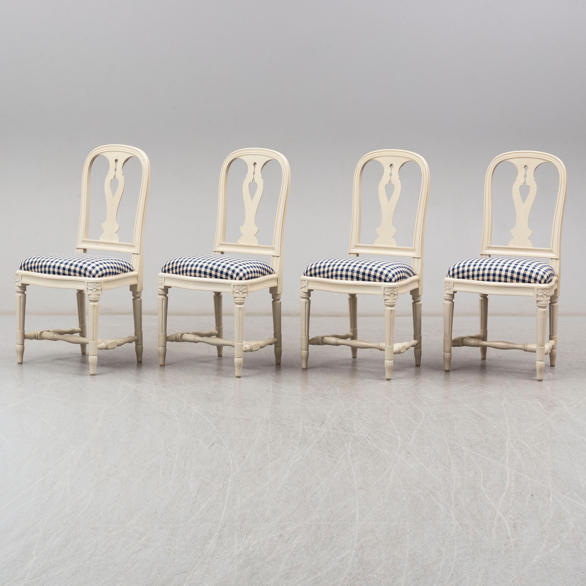 Four Swedish Gustavian style 'Hallunda' dining chairs from IKEA's 18th century collection.