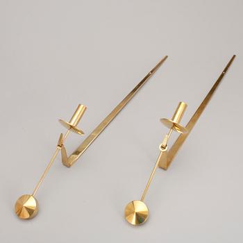 VÄGGLJUSSTAKAR, 2+2 stycken, mässing, "Reflex" samt "Pendeln", Pierre Forssell, Skultuna.