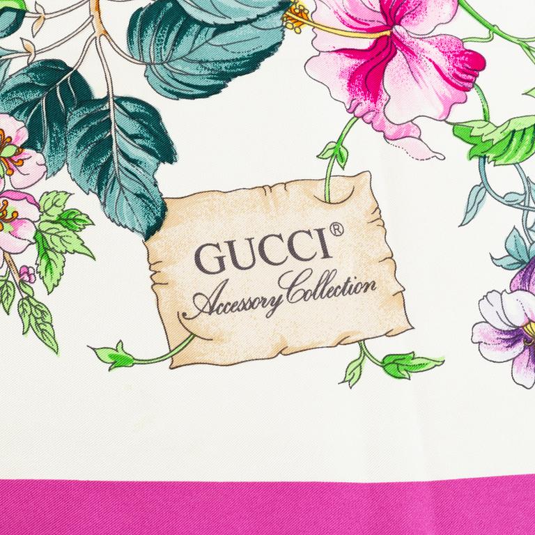 Gucci, A silk scarf.