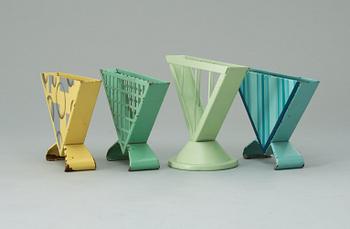 A set of four Marianne Brandt enameled metal napkin holders, Ruppelwerk Metallwarenfabrik, Gotha, Germany circa 1930-32.