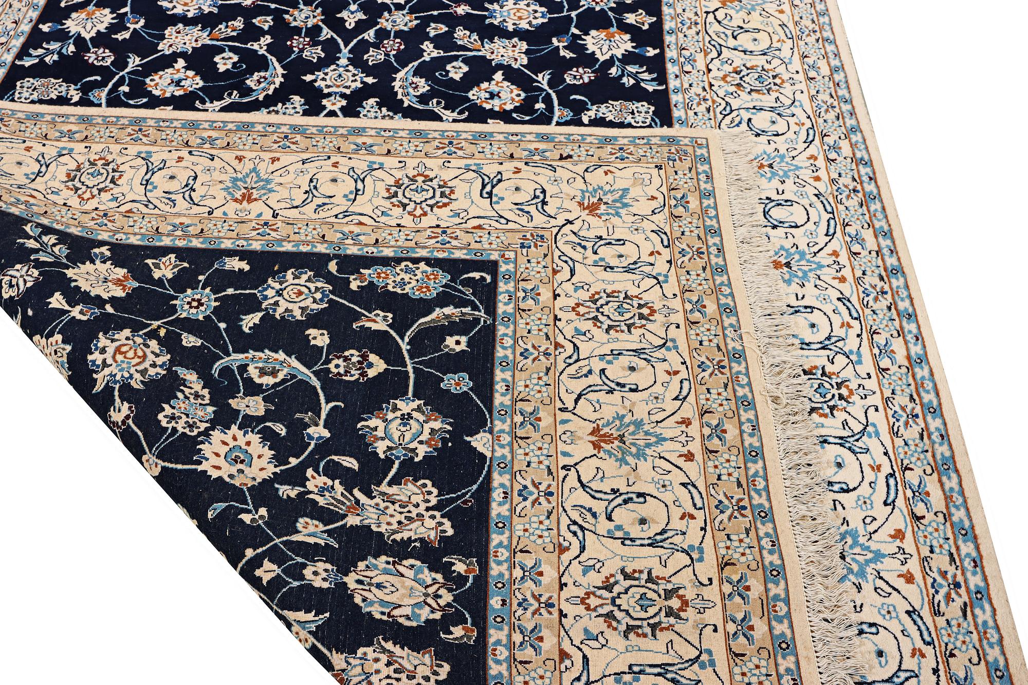 A part silk Nain rug, 9LA, c. 302 x 198 cm.