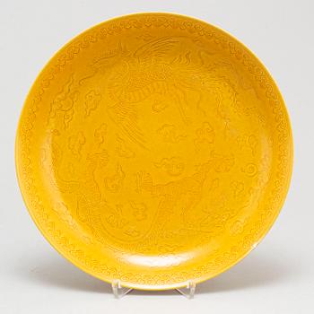 A Chinese yellow-glazed dish, 20th century.