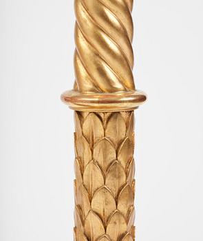 A pair of late Gustavian giltwood torchères by J. Frisk (master in Stockholm 1805-24).
