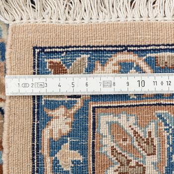 A part silk Nain carpet, approx. 460 x 324 cm.