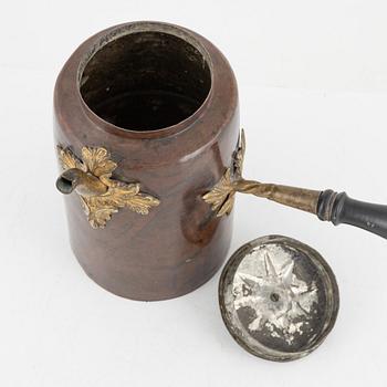 A Swedish copper and brass rococo coffee pot, later part of the 18th century.