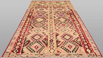 A Nomad Kelim Kord carpet, 387 x 185 cm.