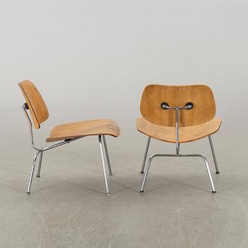 CHARLES & RAY EAMES - FÅTÖLJER, ett par, "LCM", 1900-talets andra hälft.