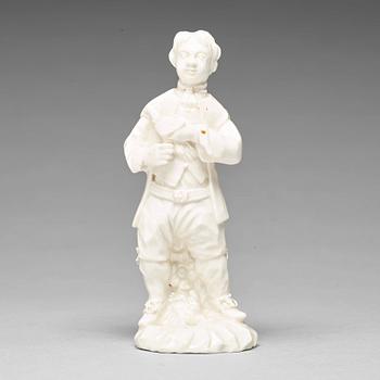 309. A Swedish Marieberg soft paste figure of a man with a bird, 18th Century.