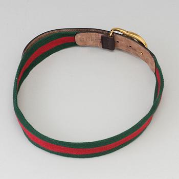 A canvas belt by Gucci.