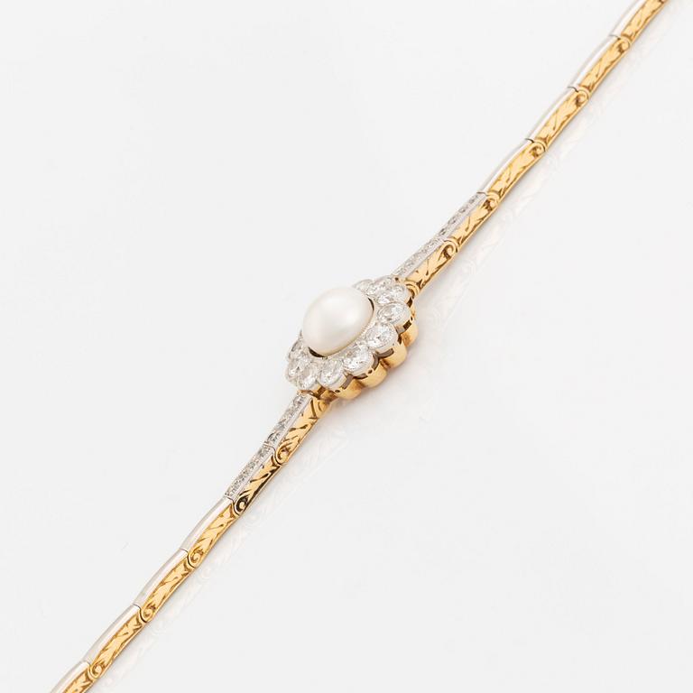 A gold and platinum bracelet with a bouton pearl and set with old- and eight-cut diamonds.