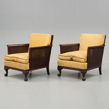 a pair of chippendale style armchairs from the 1930's/-40's.