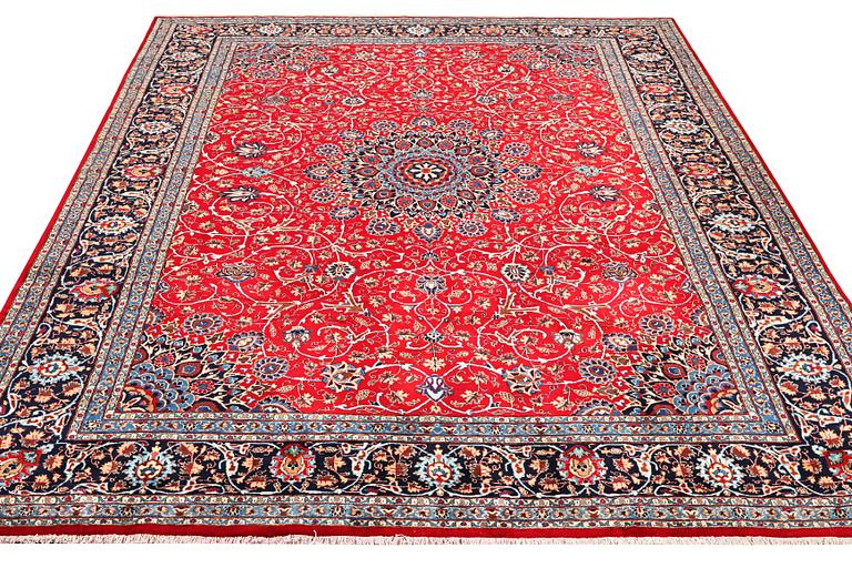 A Kashan carpet, c. 400 x 297 cm.