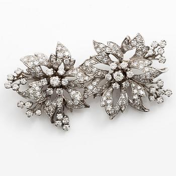 Brosch platina med runda briljant- och åttkantslipade diamanter.