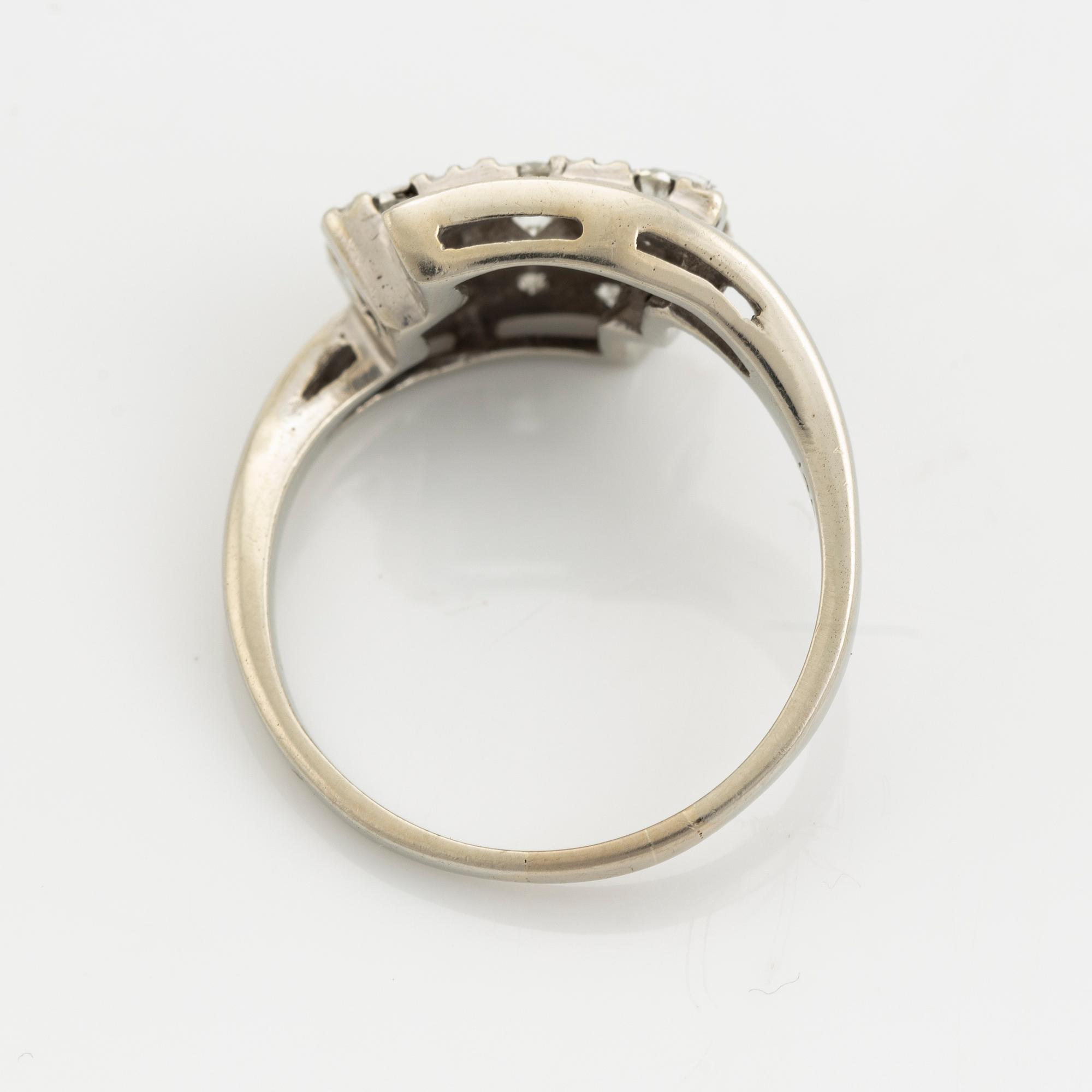 A 14K gold ring set with diamonds.