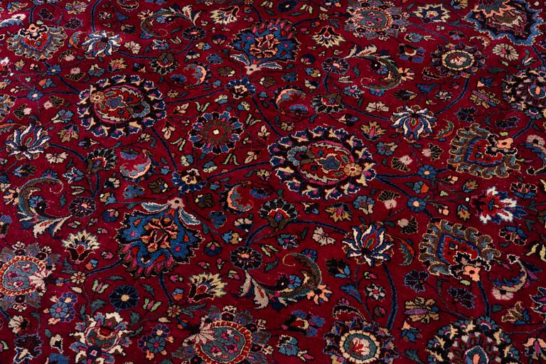 A Meshed carpet, c. 393 x 305 cm.