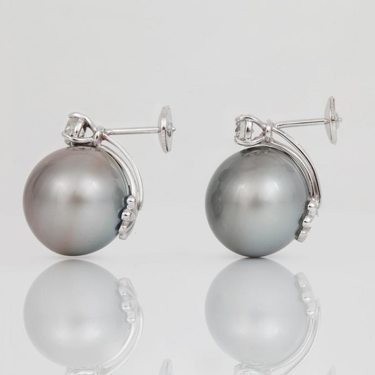 A pair of cultured Tahiti pearl, Ø 16 mm, and brilliant-cut diamond earrings.