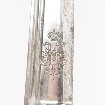 An Imperial Russian dragoon officer's shashka m 1881-1909, manufacturer's mark Zlatoust.