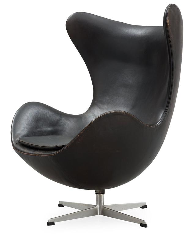 An Arne Jacobsen black leather 'Egg' chair, Fritz Hansen, Denmark, circa 1960.