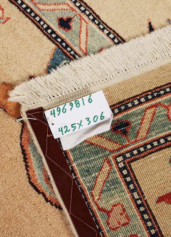 A Mamluk design carpet, c. 425 x 306 cm.