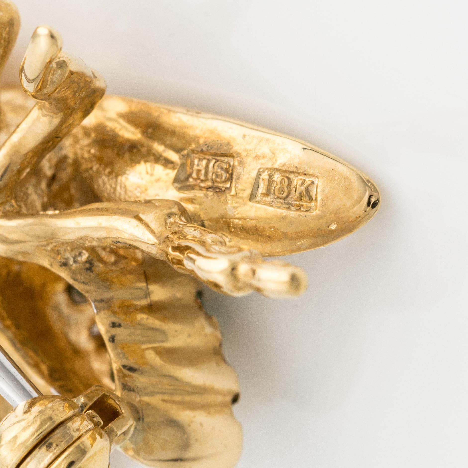 Brooch, in the shape of an insect, gold with emeralds and brilliant-cut diamonds.