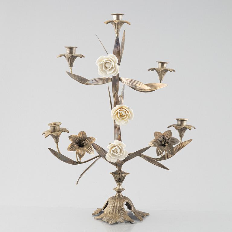 Three nickle-plated  candelabras, France, first half of the 20th century.