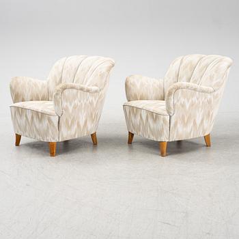 A pair of Swedish Modern lounge chairs, 1940's/50's.