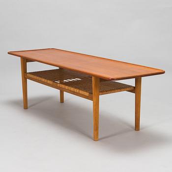An oak and tek coffee table by Hans J Wegner for Andreas Tuck, 1960s.