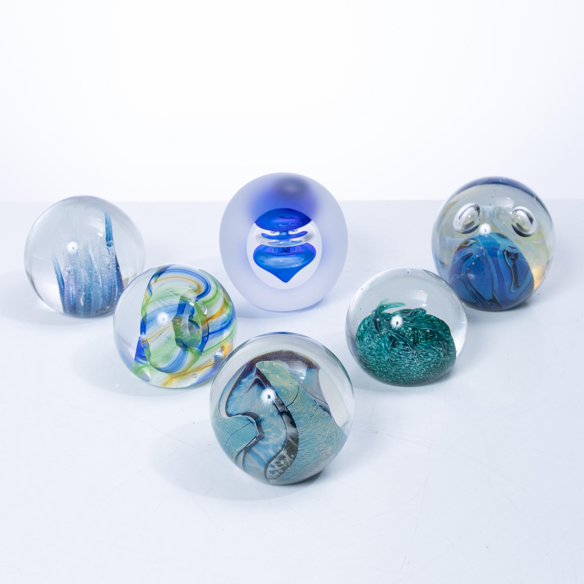 Six glass paperweights, including Robert Eickholt, USA, 1985, & Caithness of Scotland.