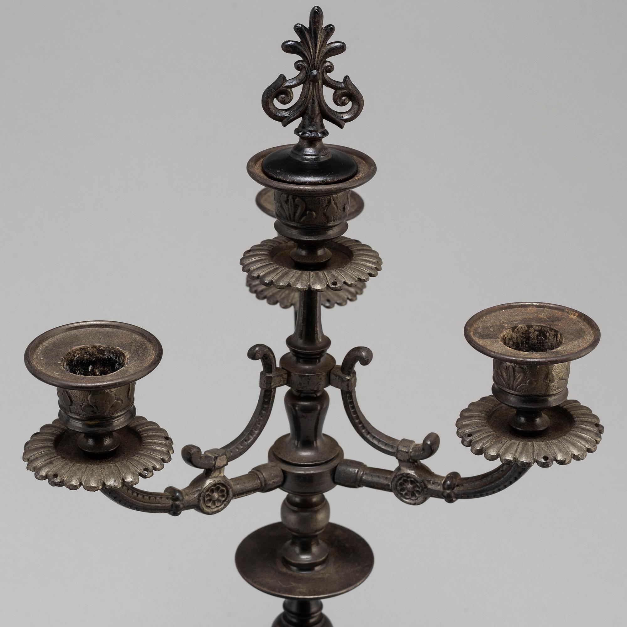 A bar of late 19th Century candelabras.