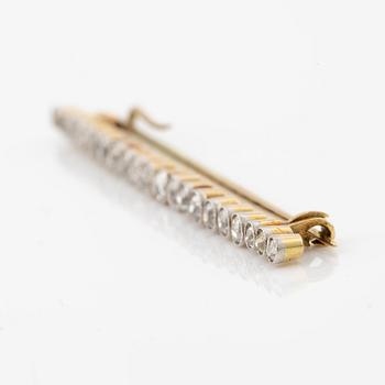 A brooch/pendant, pin, gold and platinum set with old-cut diamonds.