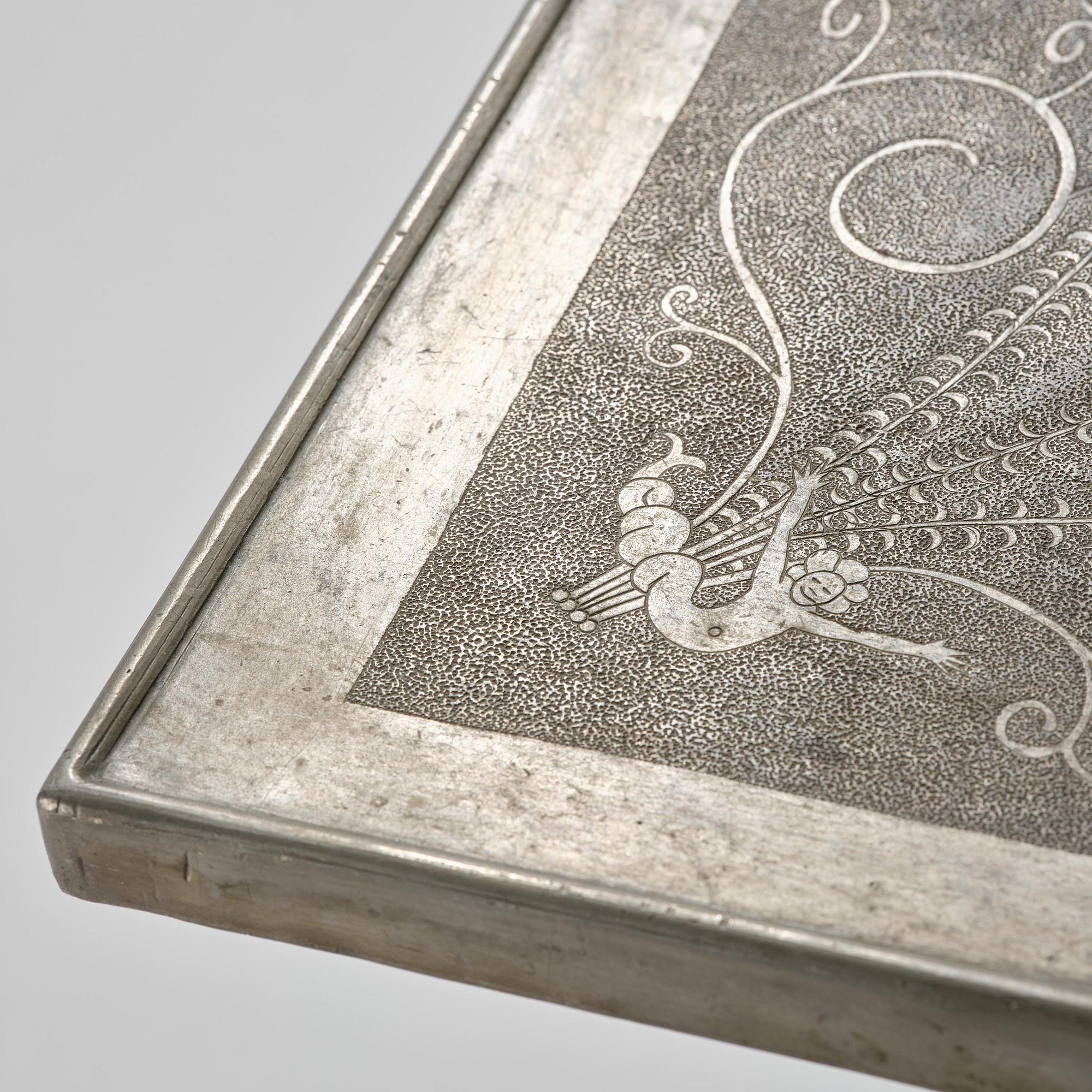 Anna Petrus, a pewter top tray table on a base by Uno Åhrén, executed in her studio, Stockholm, ca 1922-25.