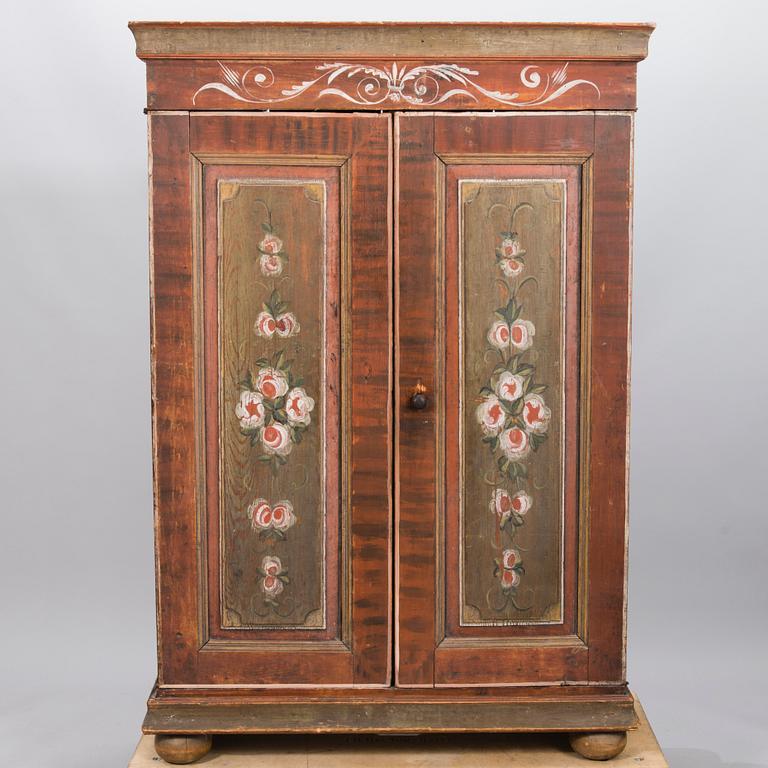 A painted cabinet, early 19th century.