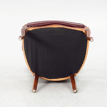 A Rococo style armchair, second half of the 20th Century.