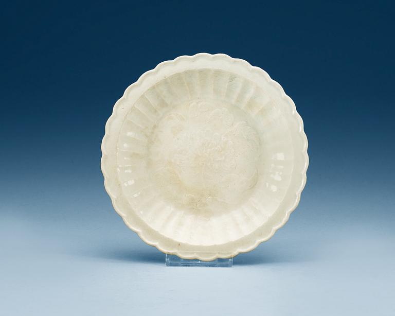 A white glazed ding yao dish. Song dynasty (960-1279).