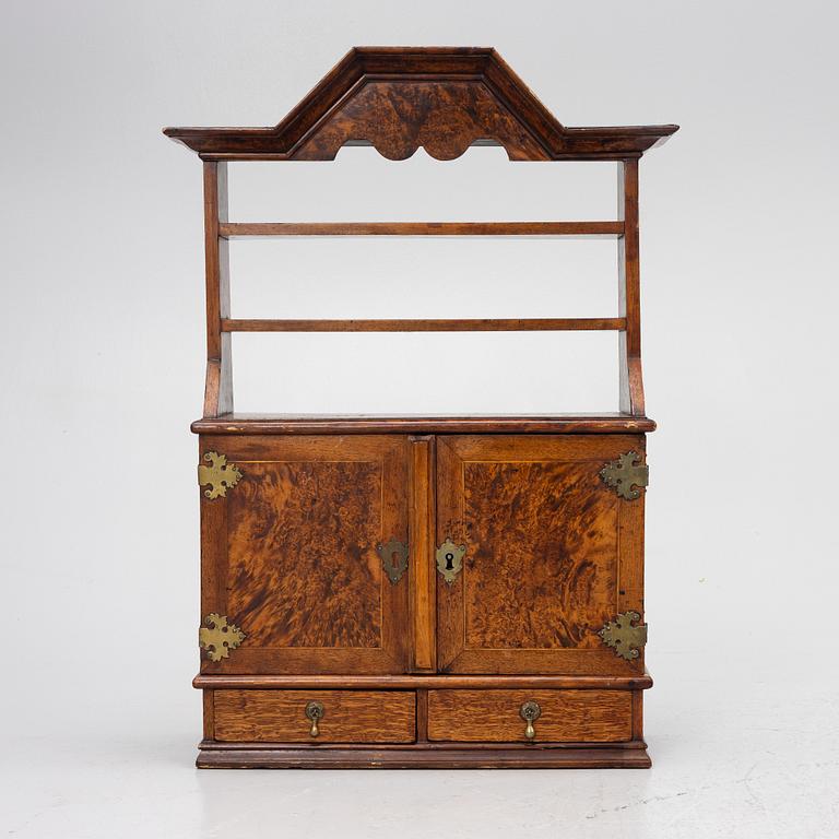 A late Baroque wall cabinet with shelves, first half of the 18th century.