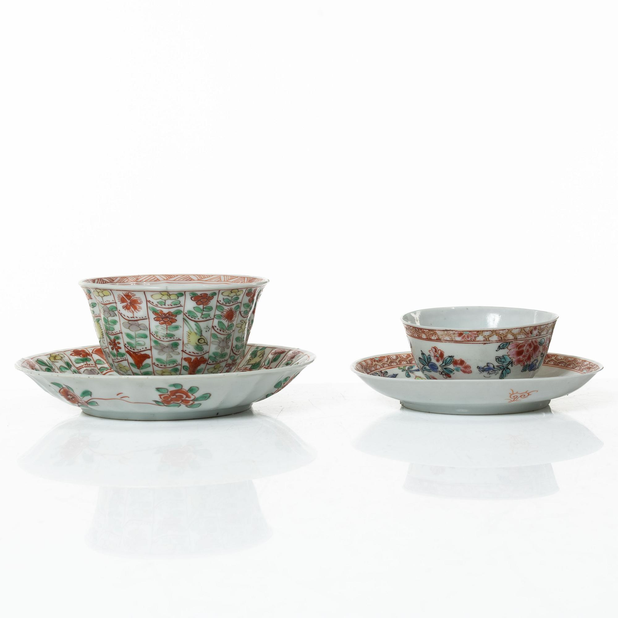 Two Chinese porcelain cups with saucers, Qing dynasty, 18th century.