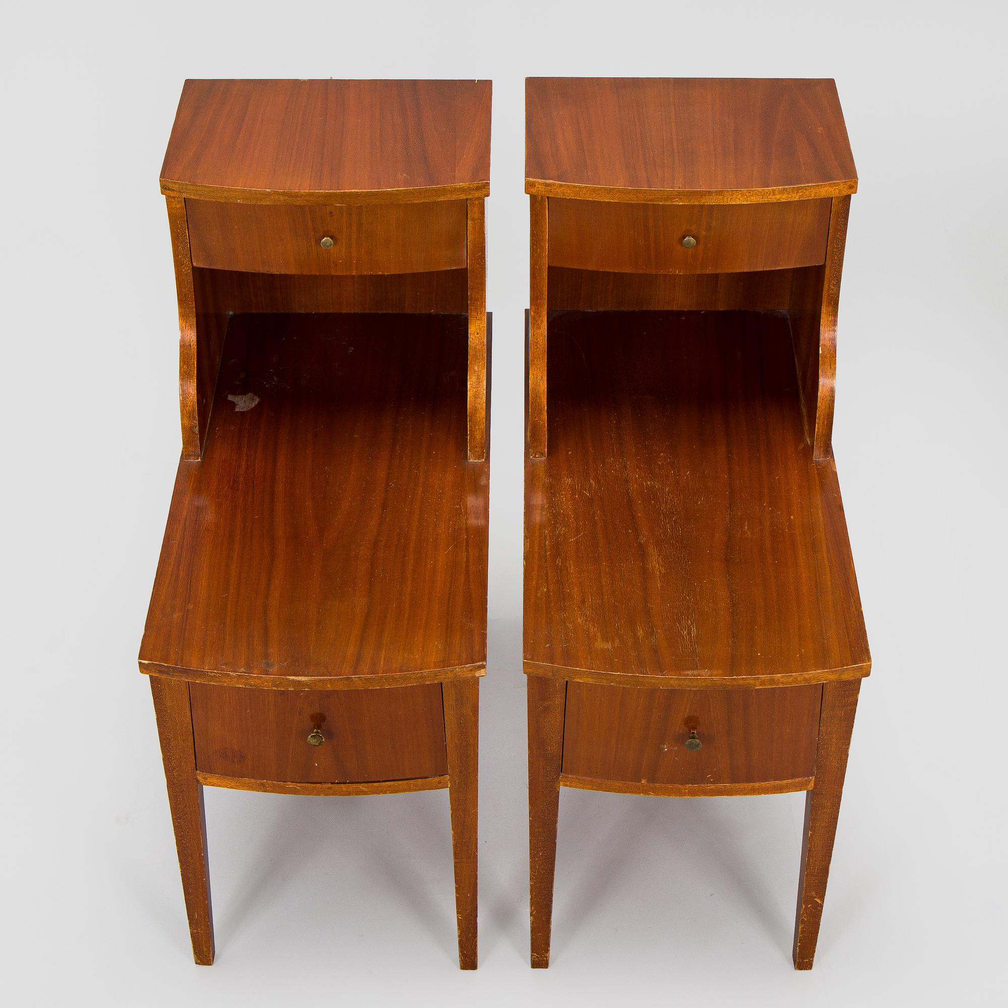 A pair of 20th century bedside tables.