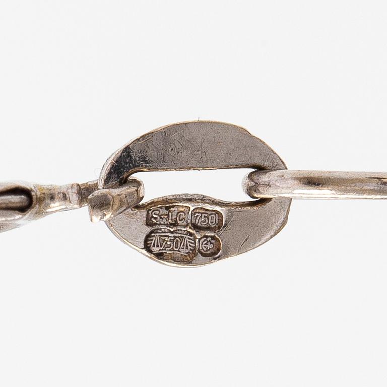 Kaulakoru, 18K valkokultaa ja timantteja n. 0.56 ct yht.