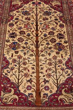 MATTO, a semi-antique silk Kashan,  ca 205 x 131,5 cm.