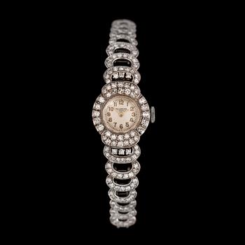 1420. A diamond ladie's wrist watch, tot. app. 2 cts.