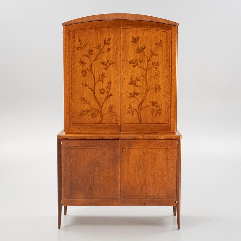 A mahogany veneered cabinet, Westbergs Möbler AB i Tranås, mid 20th Century.