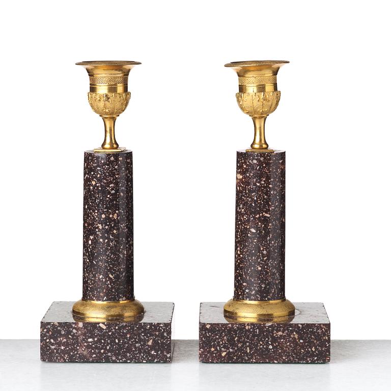 A pair of Swedish Empire candlesticks, early 19th century.