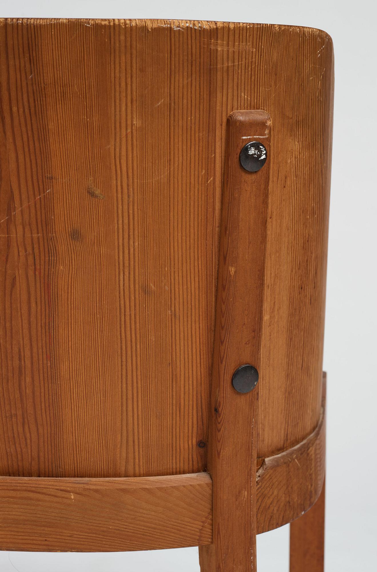 Axel Einar Hjorth, a stained pine low back "Lovö" chair, Nordiska Kompaniet, Sweden 1930's.