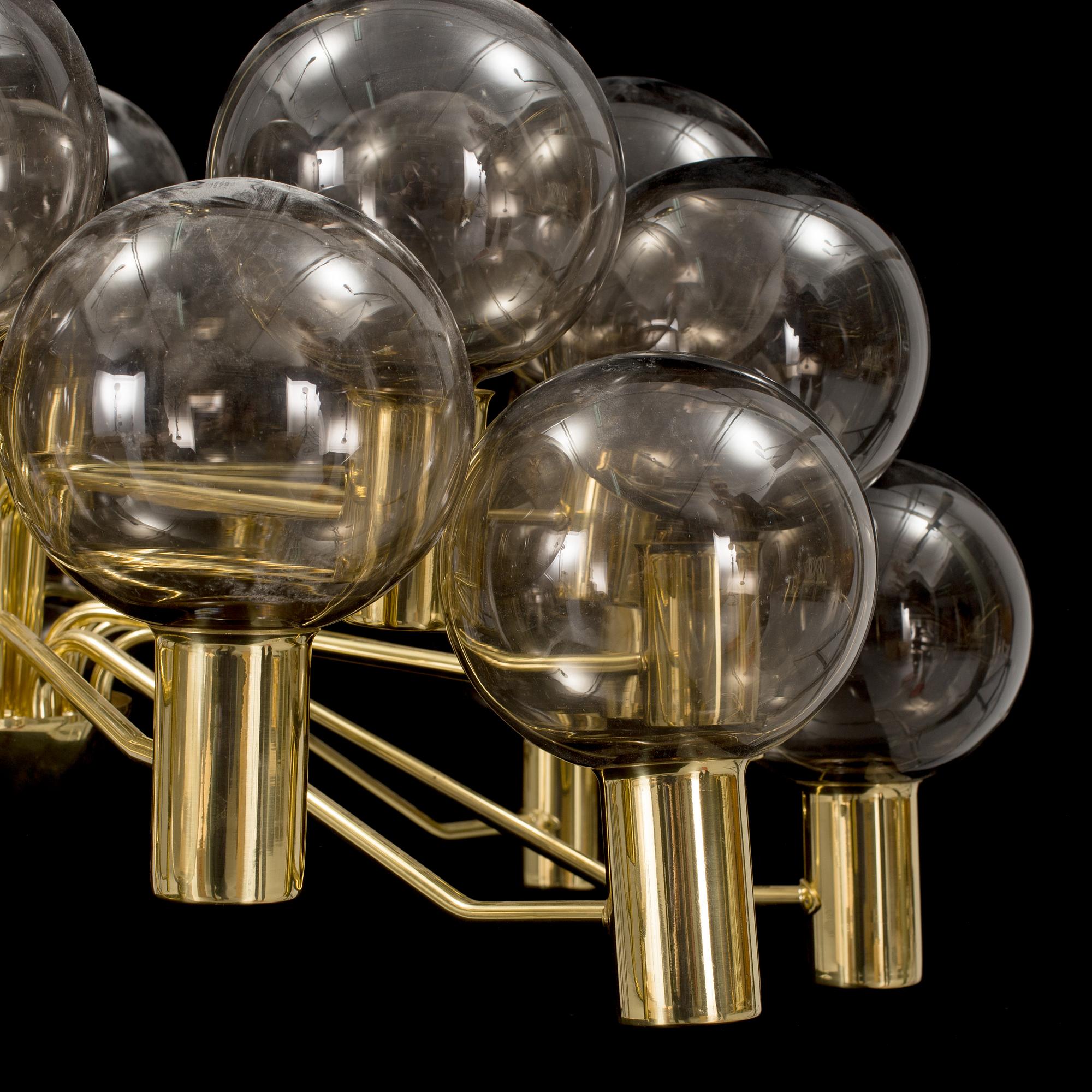 A brass ceiling light by Hans-Agne Jakobsson.
