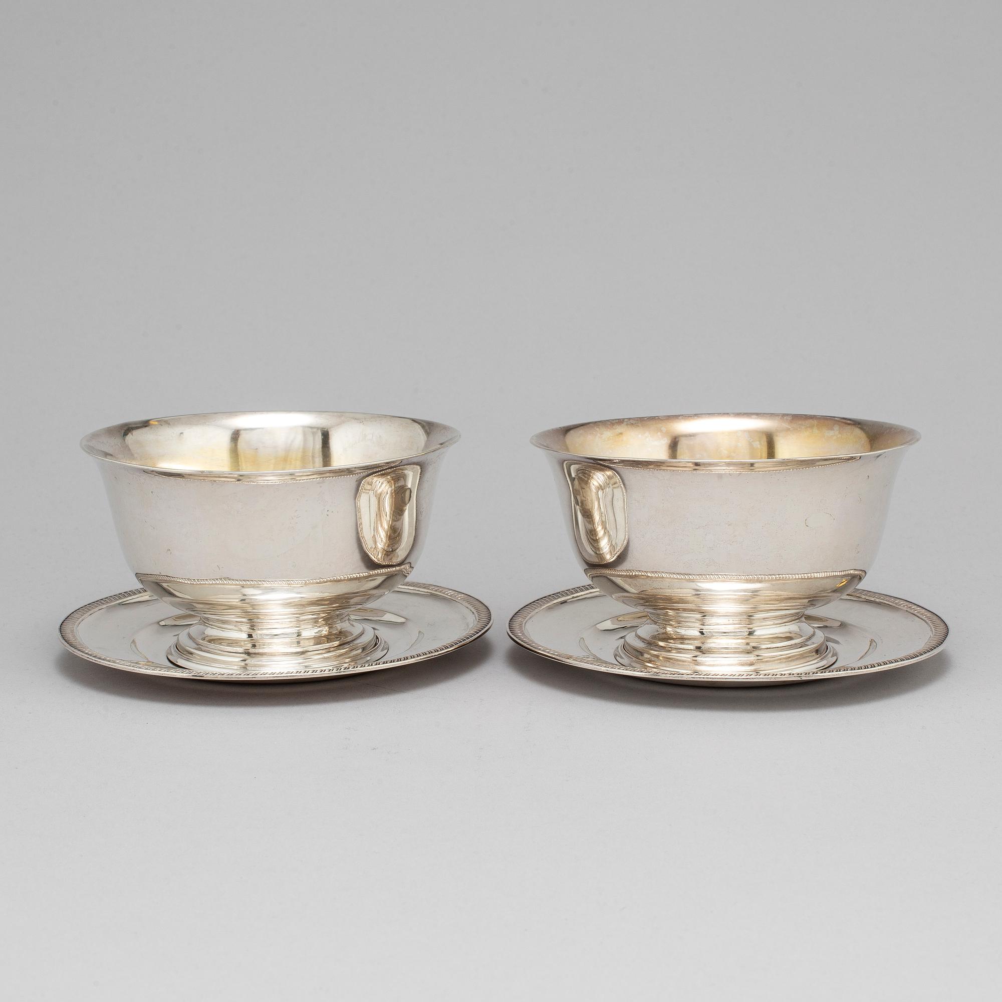 A pair of Swedish 19th century parcel-gilt silver sauce bowls, mark of JP Gronvall, Stockholm 1821.