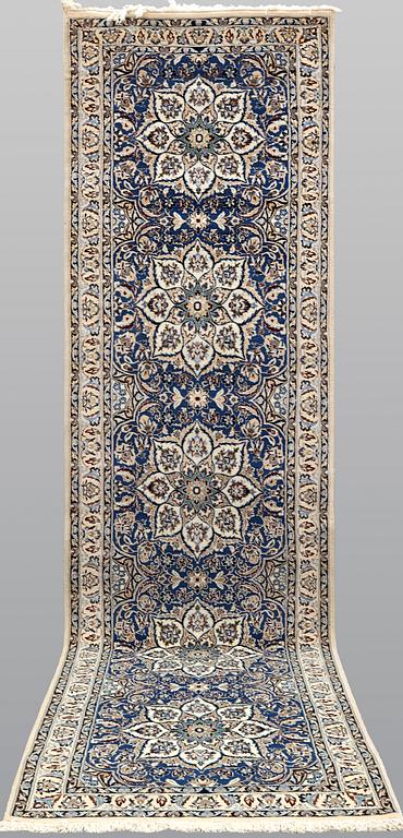 A runner carpet, Nain part silk, 380 x 100 cm.