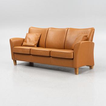 A 'Fia' leather upholstered sofa from Brunstad, 21st Century.