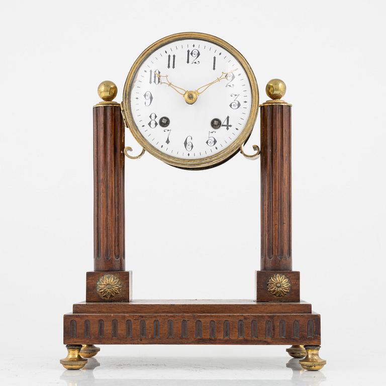 A classic style mantle clock, 19th century.