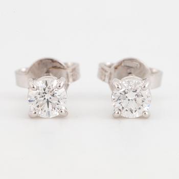 Brilliant-cut diamond earrings.